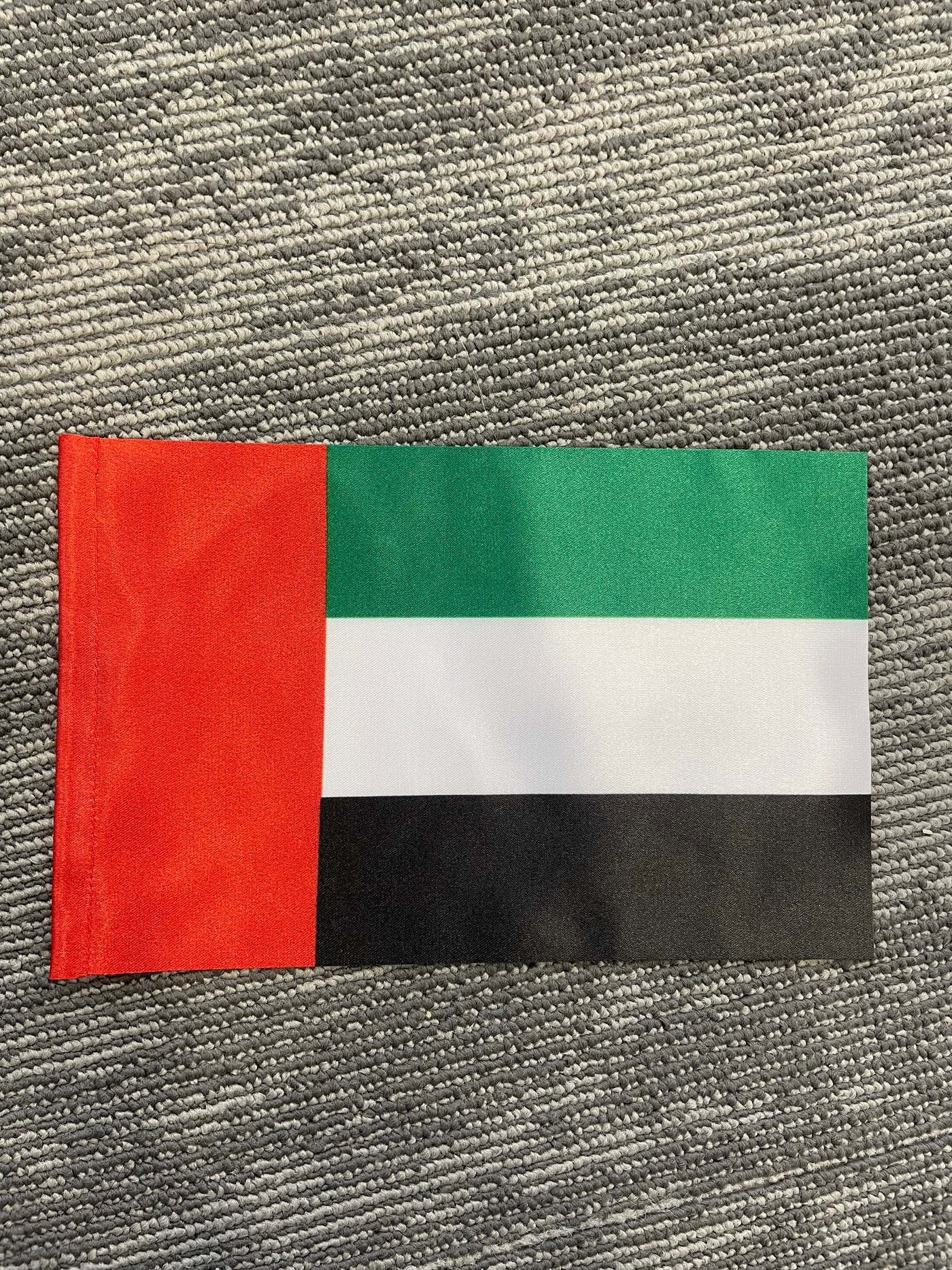 Satin table flag with double-sided print showing a correct design on both faces