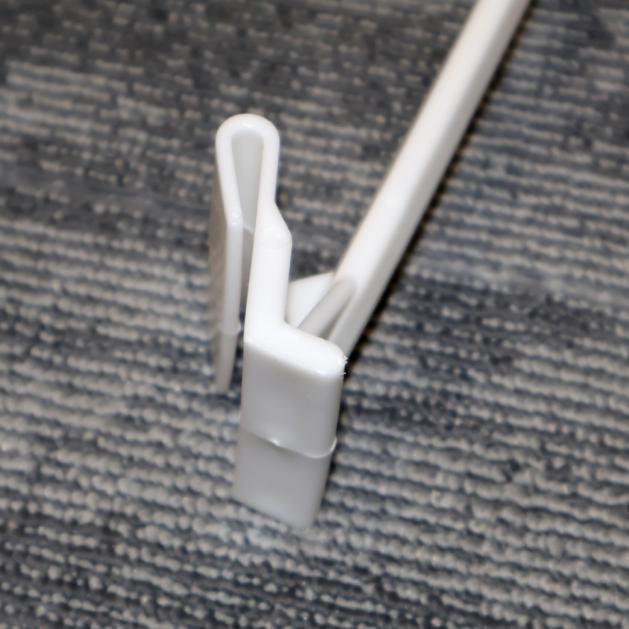Detail of the window clamp that holds the car flag pole