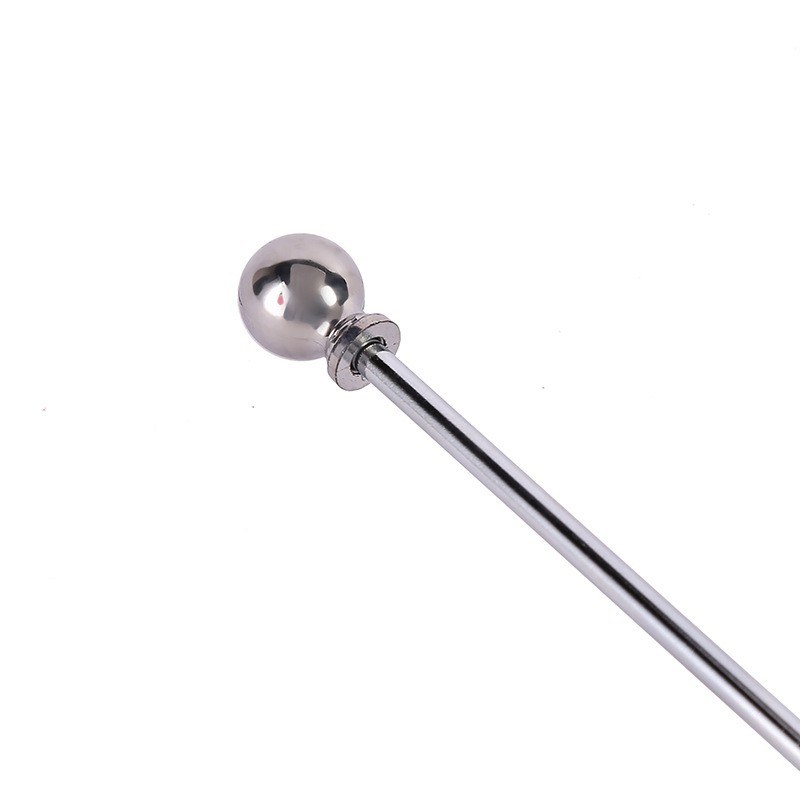 Stainless steel desktop flagpole close-up showing ball finial