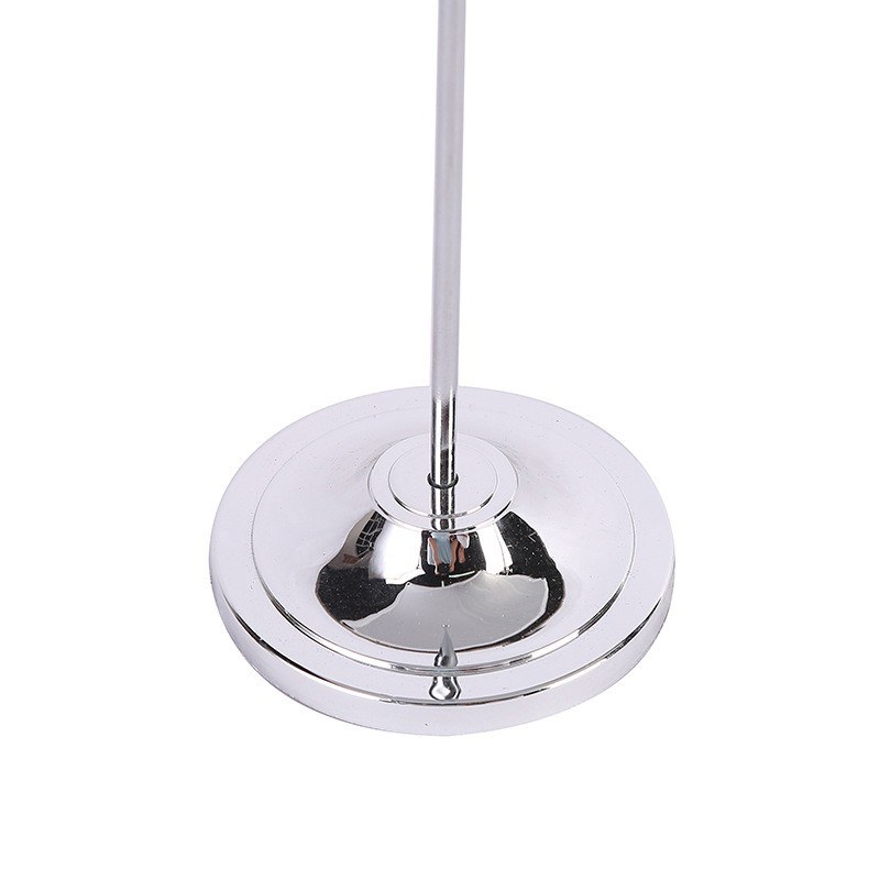 Plastic base for a desktop flagpole with stainless steel pole